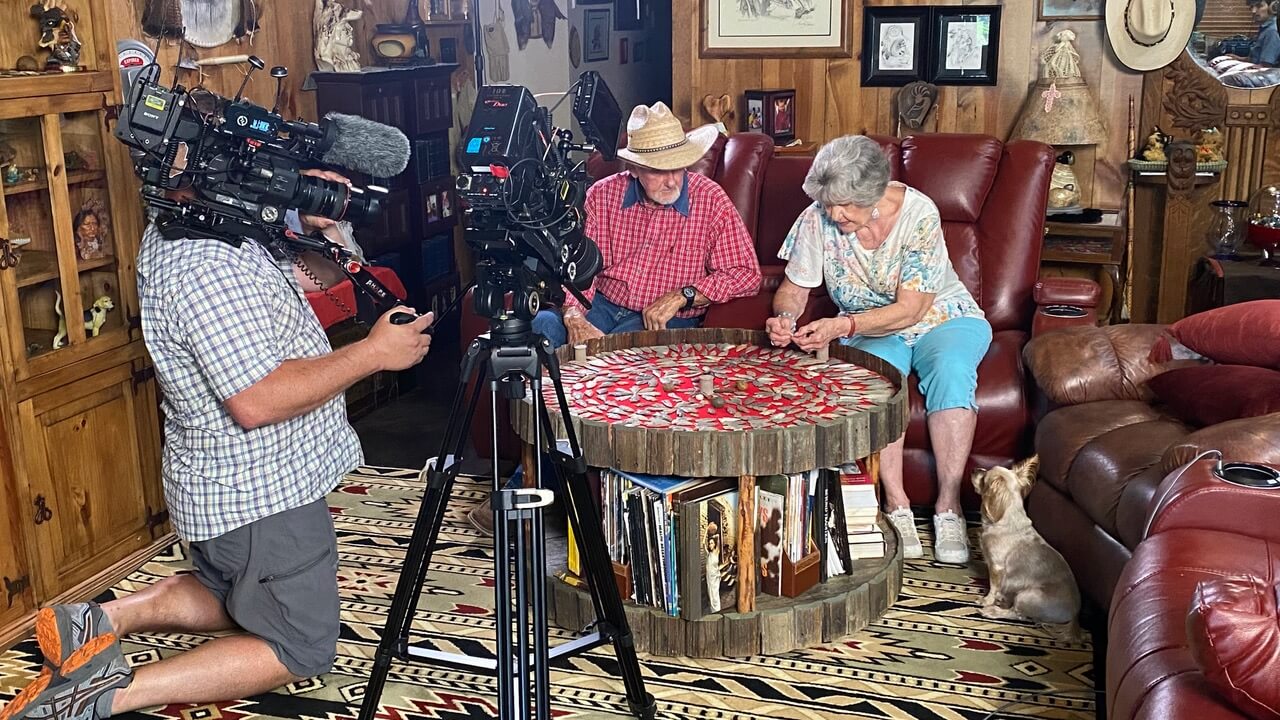 B-roll of Doris and Howard Lindsey examining clovis points being recorded